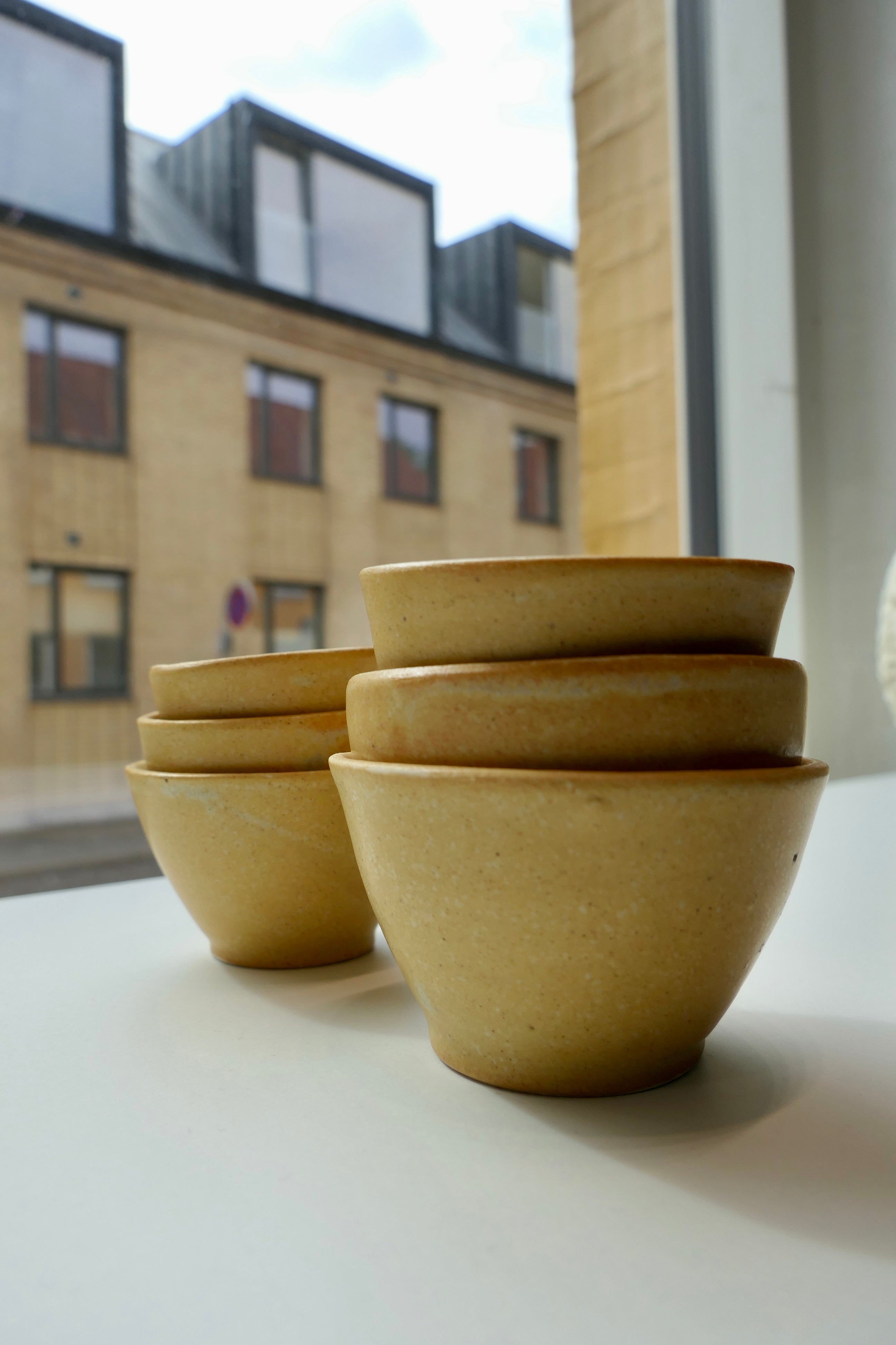 Tiny yellow cups