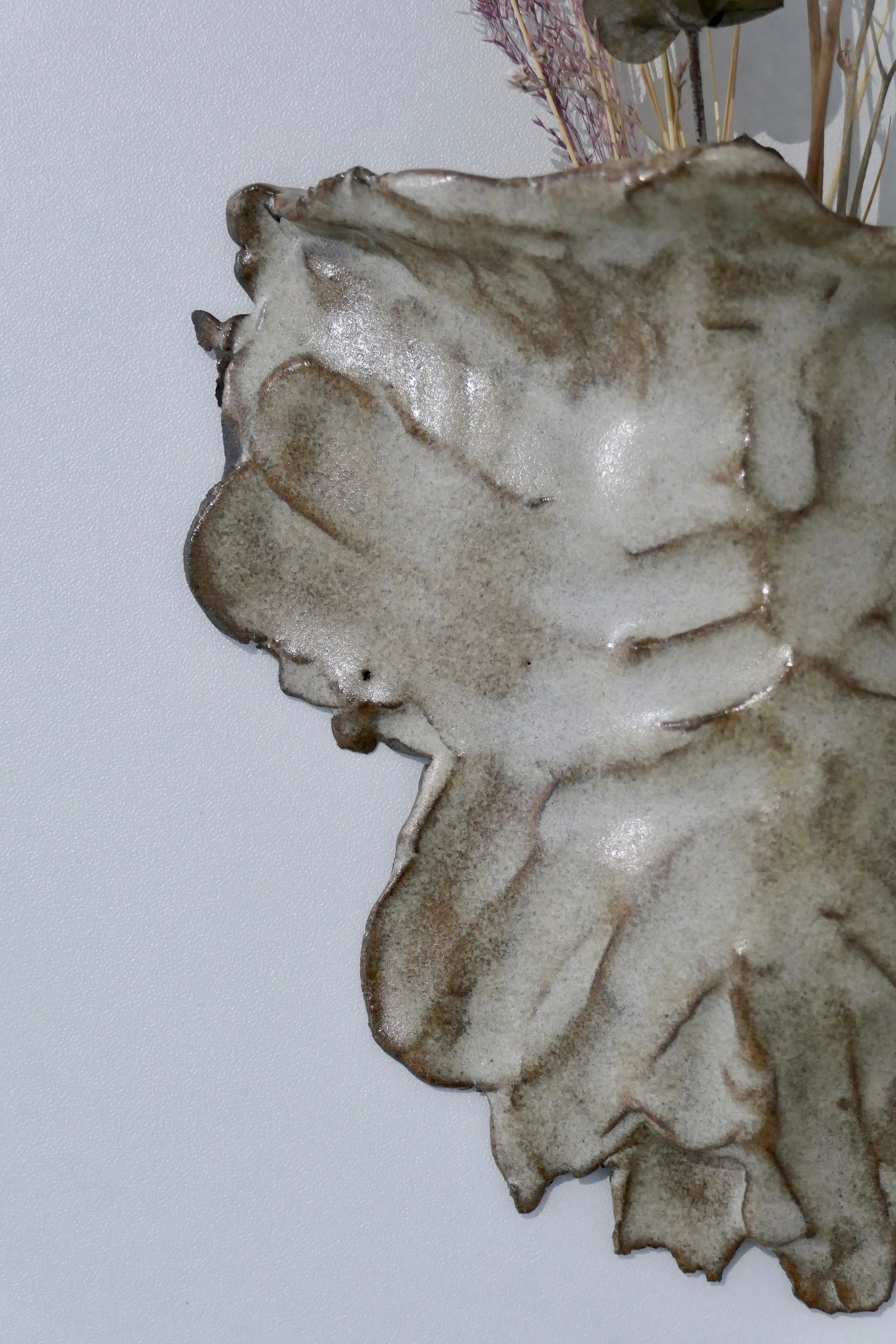 Sand-colored wall vase