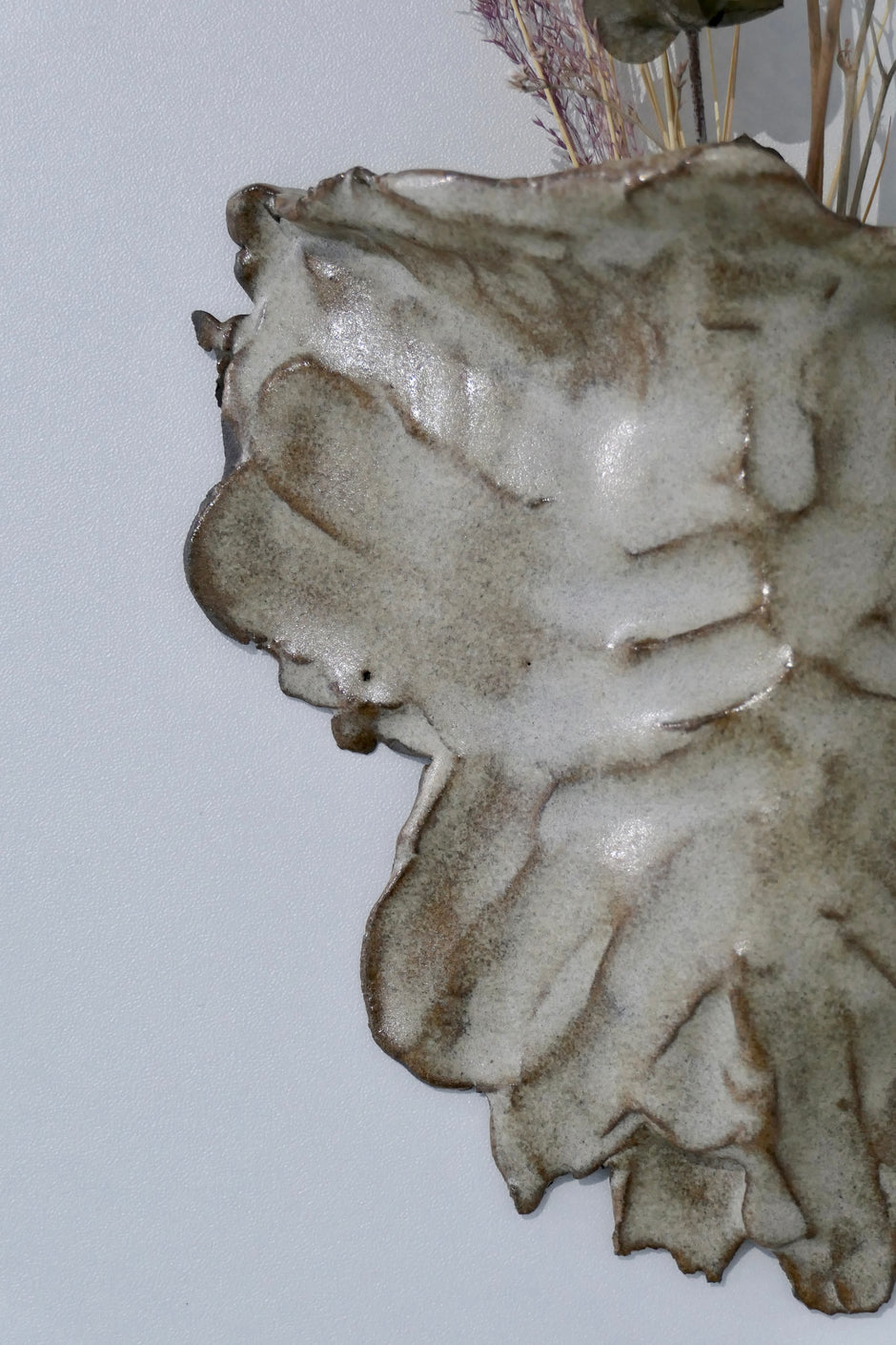 Sand-colored wall vase