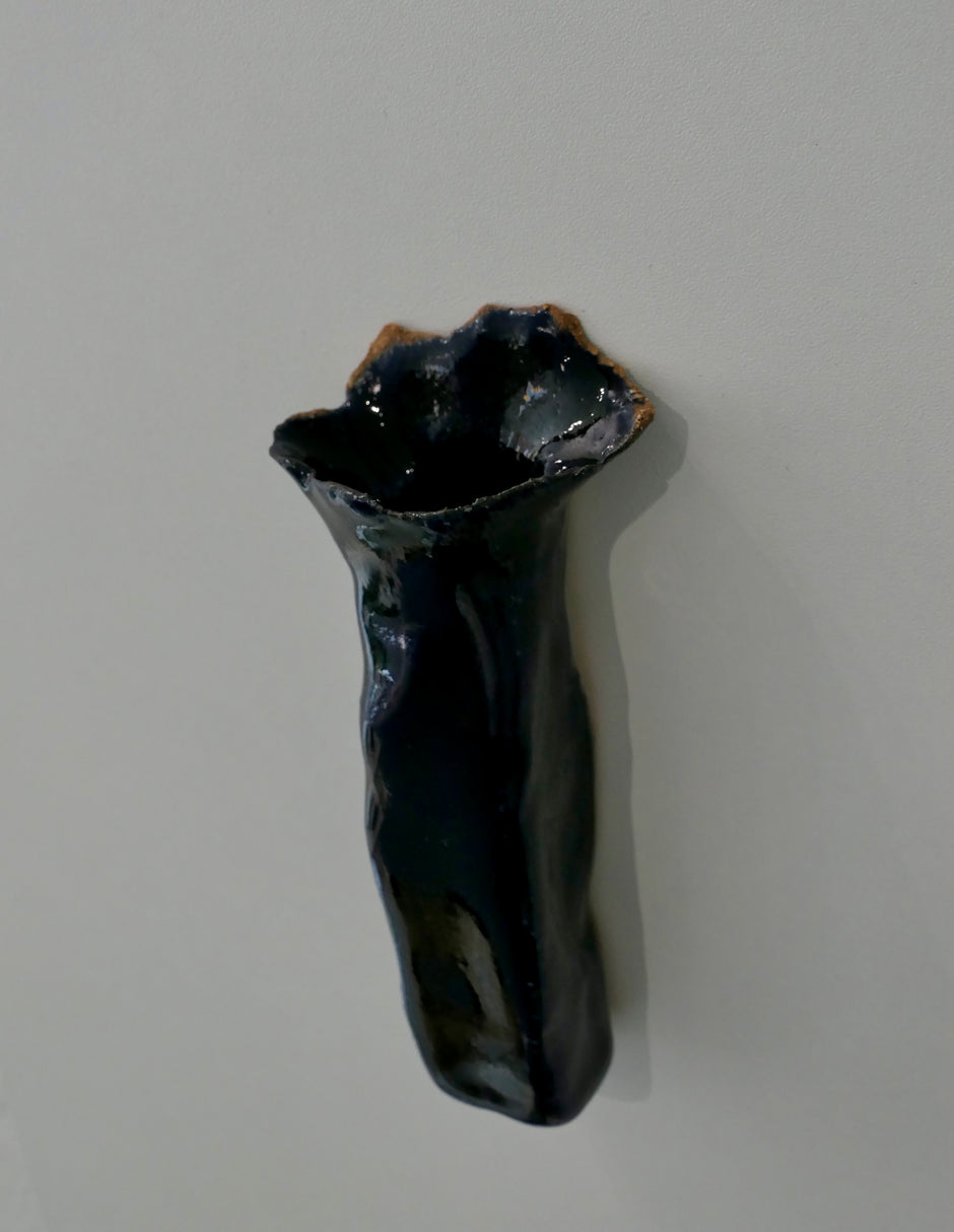 Dark blue wall vase