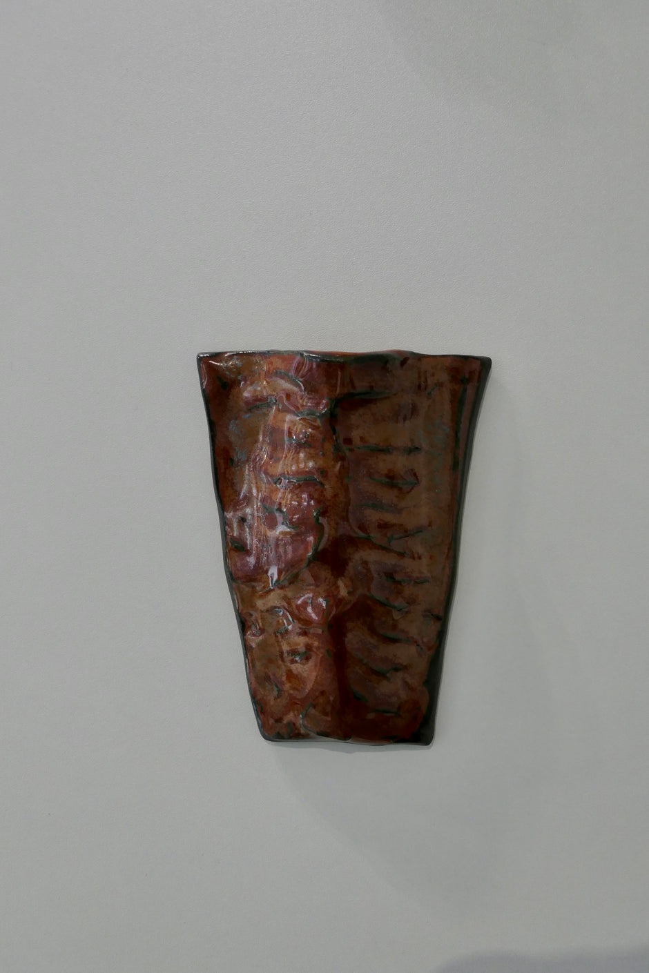 Flat dark red wall vase