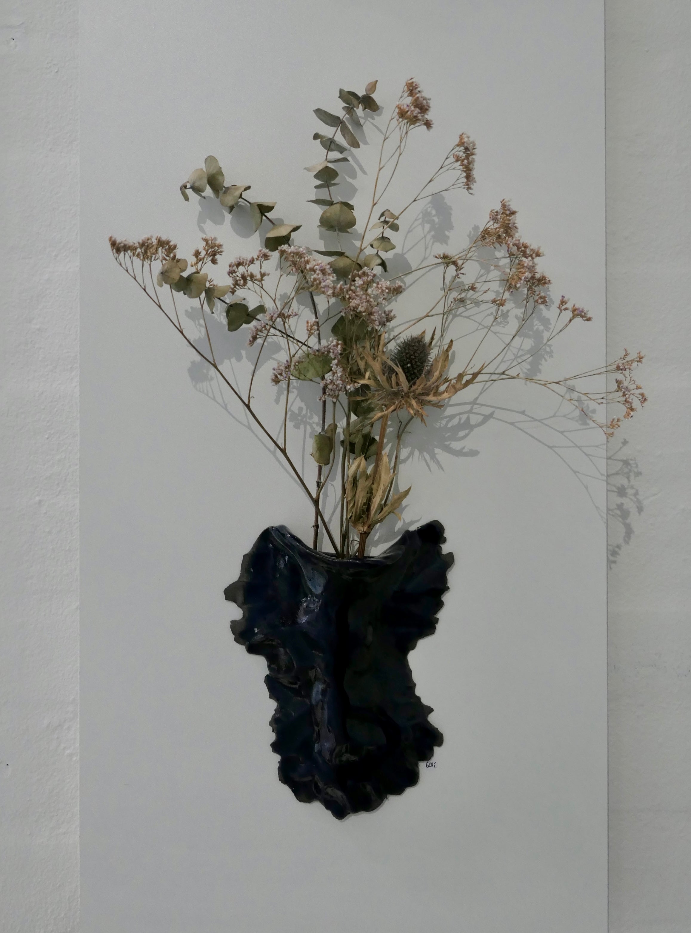 Dark blue wall vase