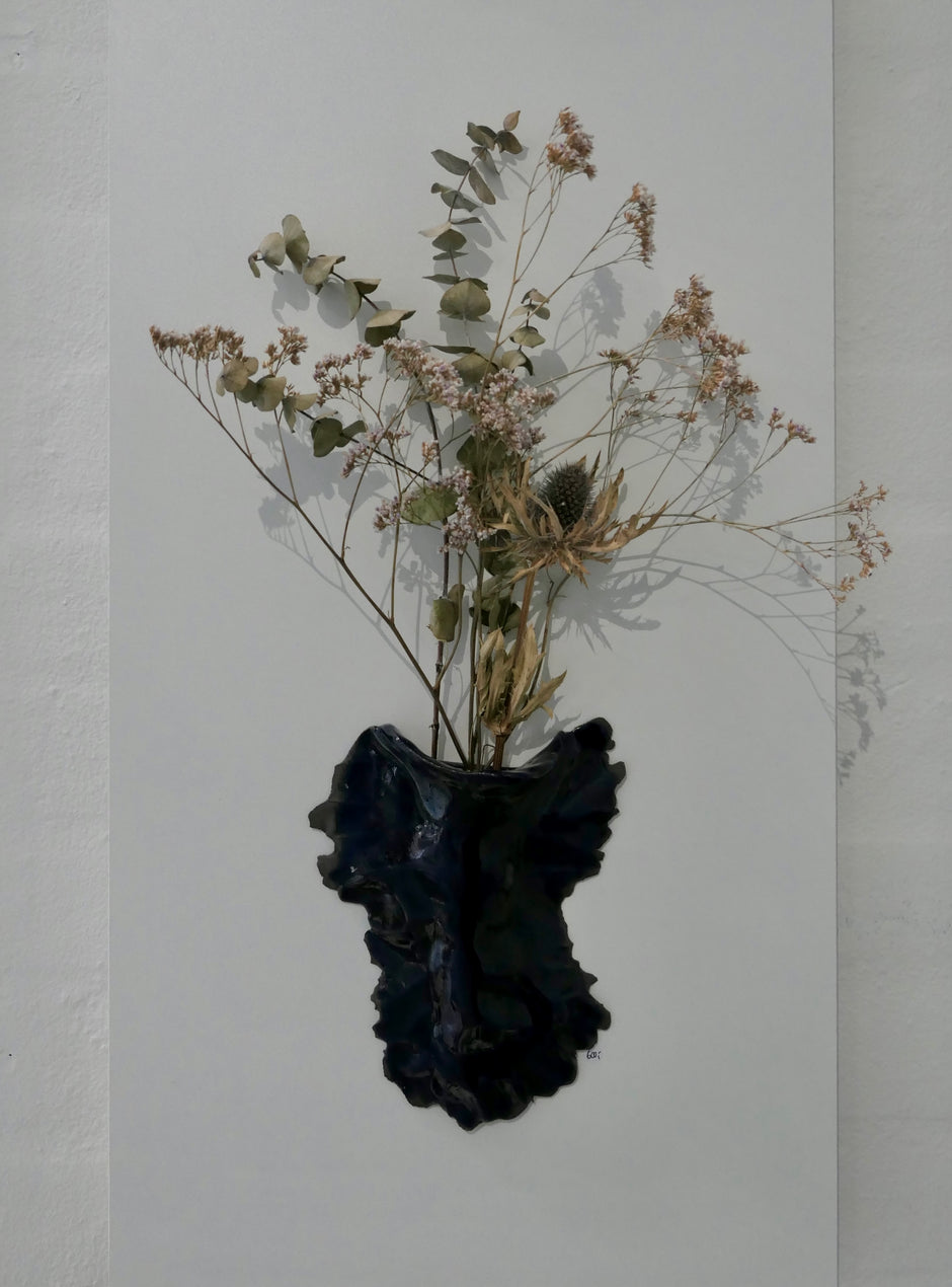 Dark blue wall vase