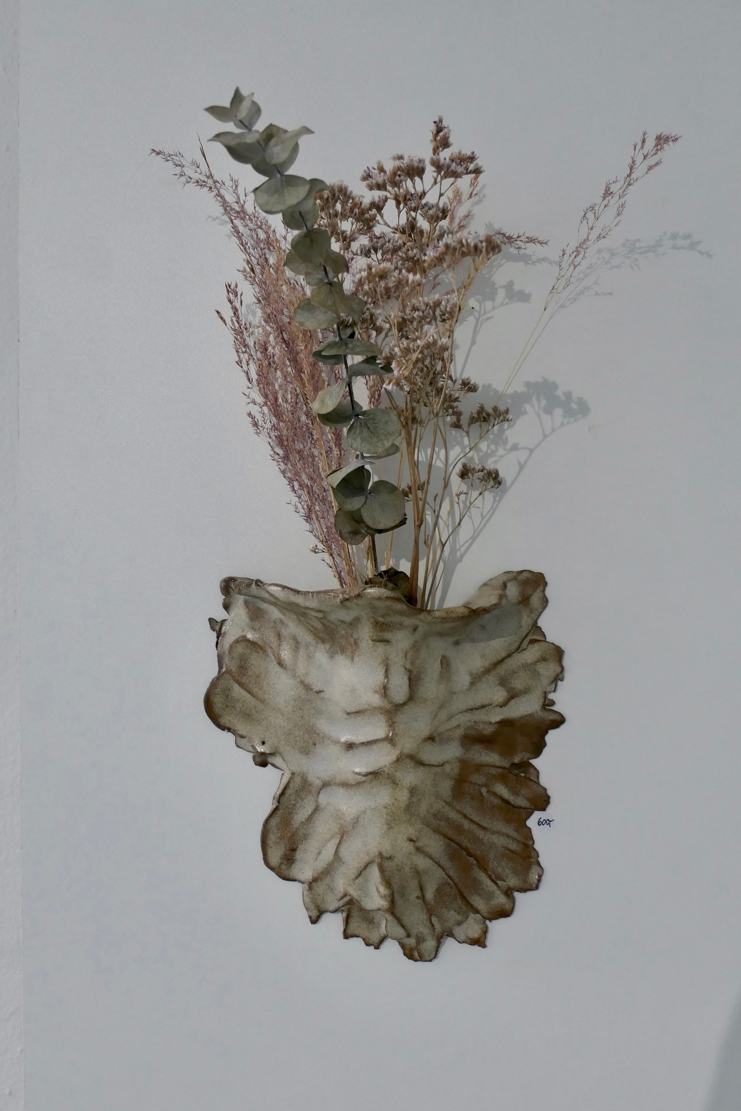 Sand-colored wall vase
