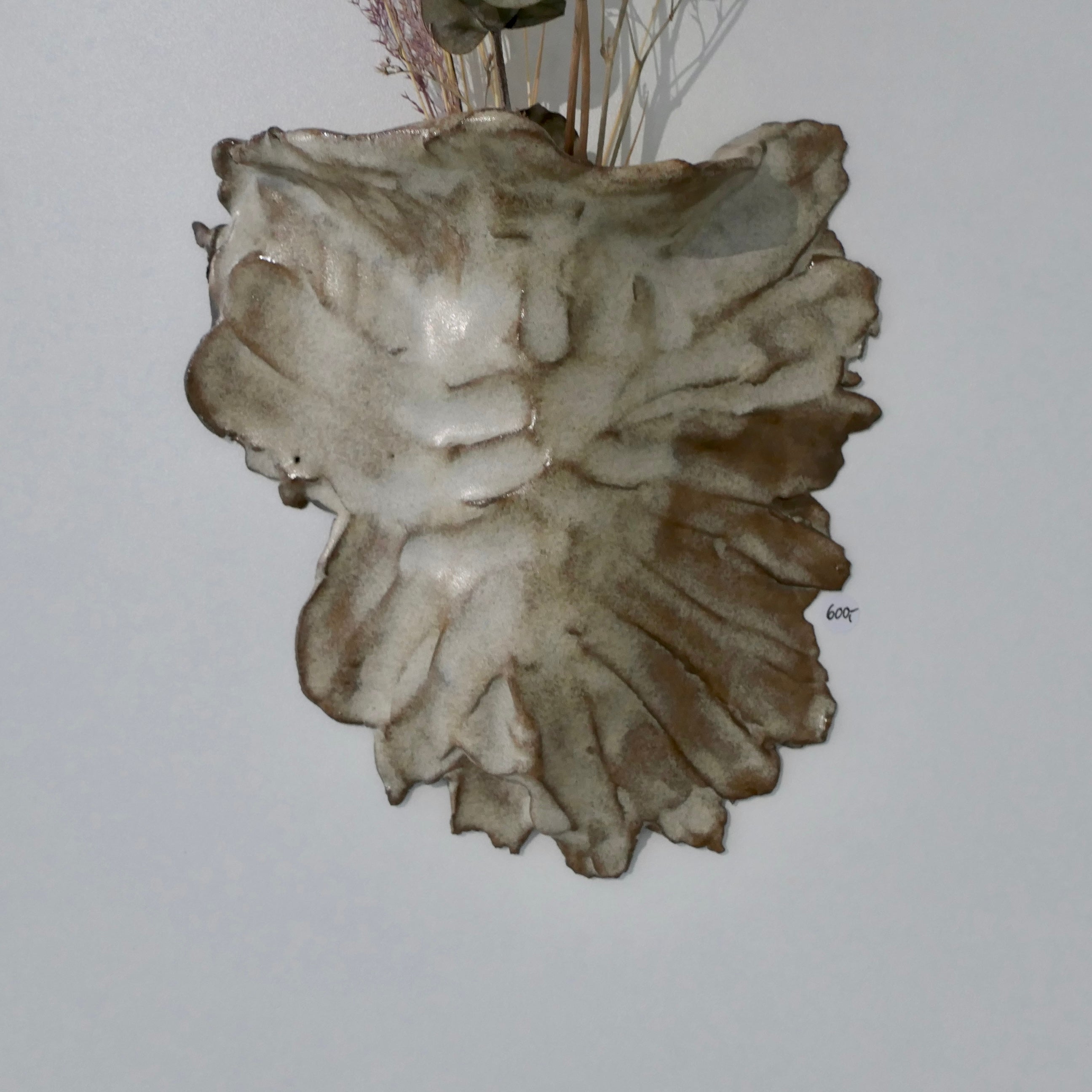 Sand-colored wall vase