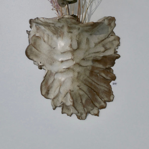 Sand-colored wall vase