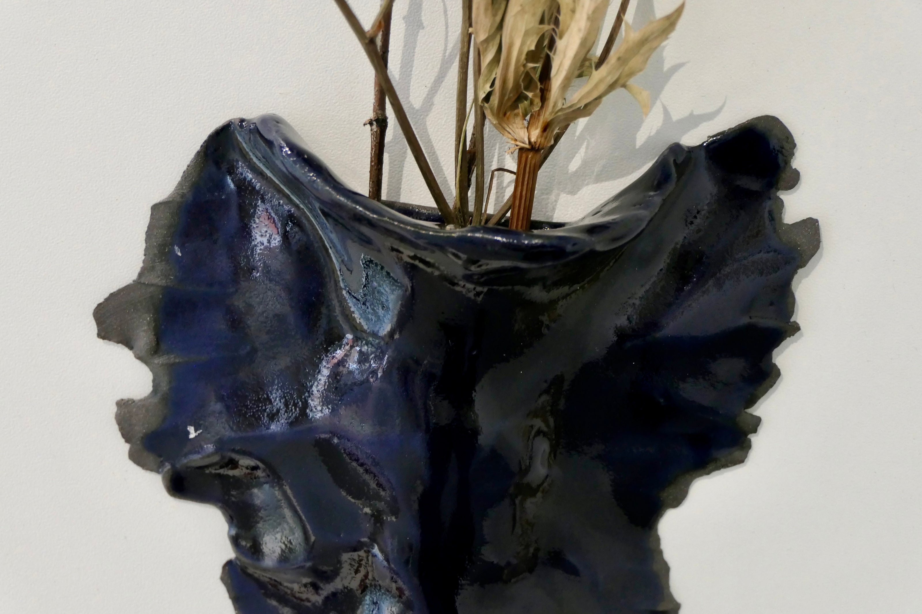 Dark blue wall vase