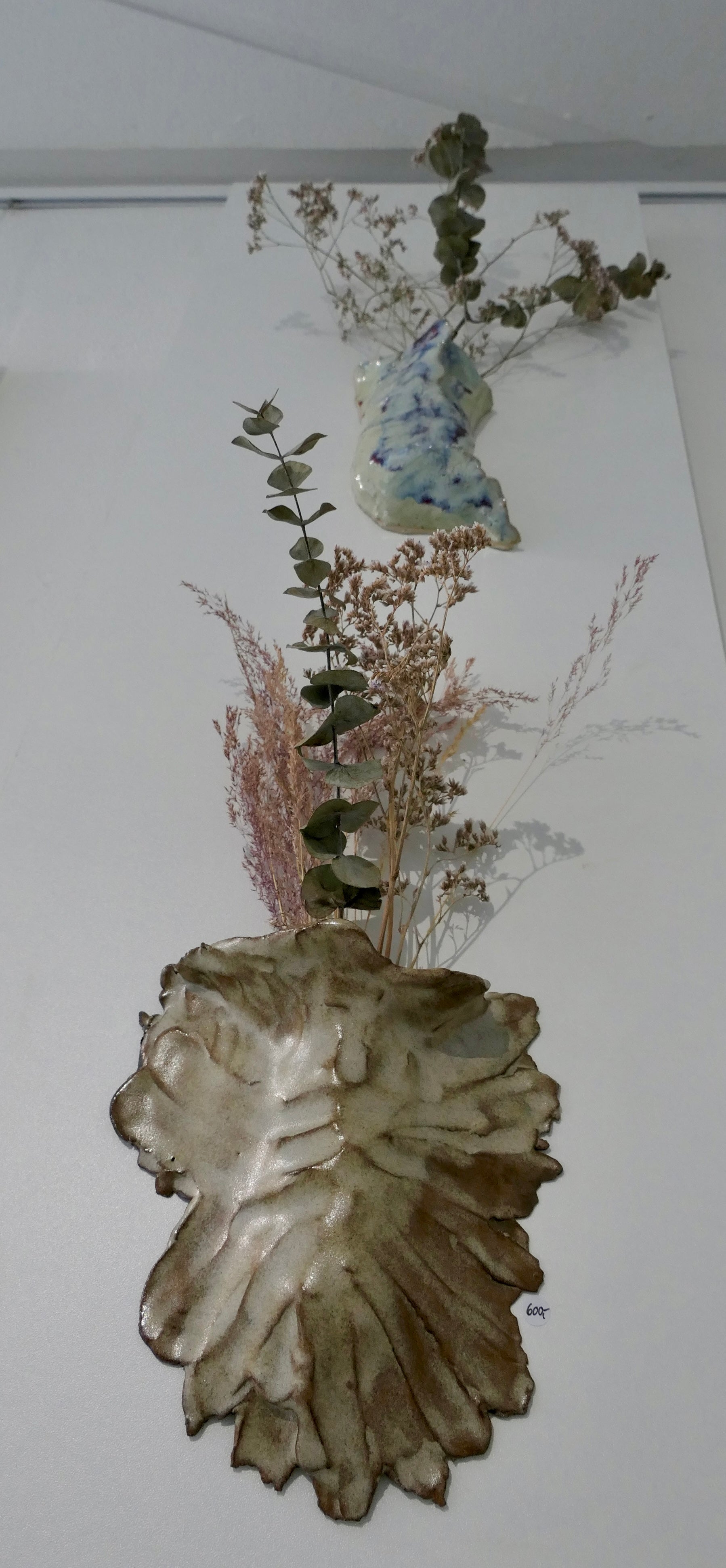 Sand-colored wall vase