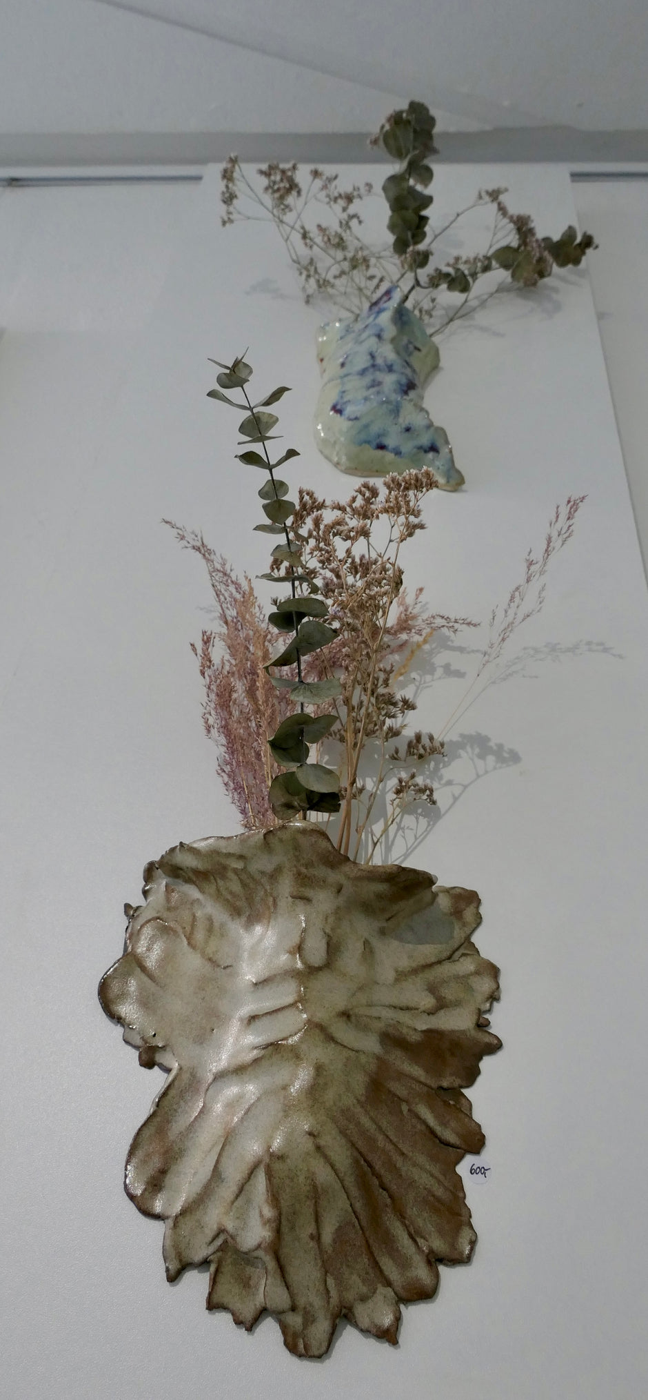 Sand-colored wall vase