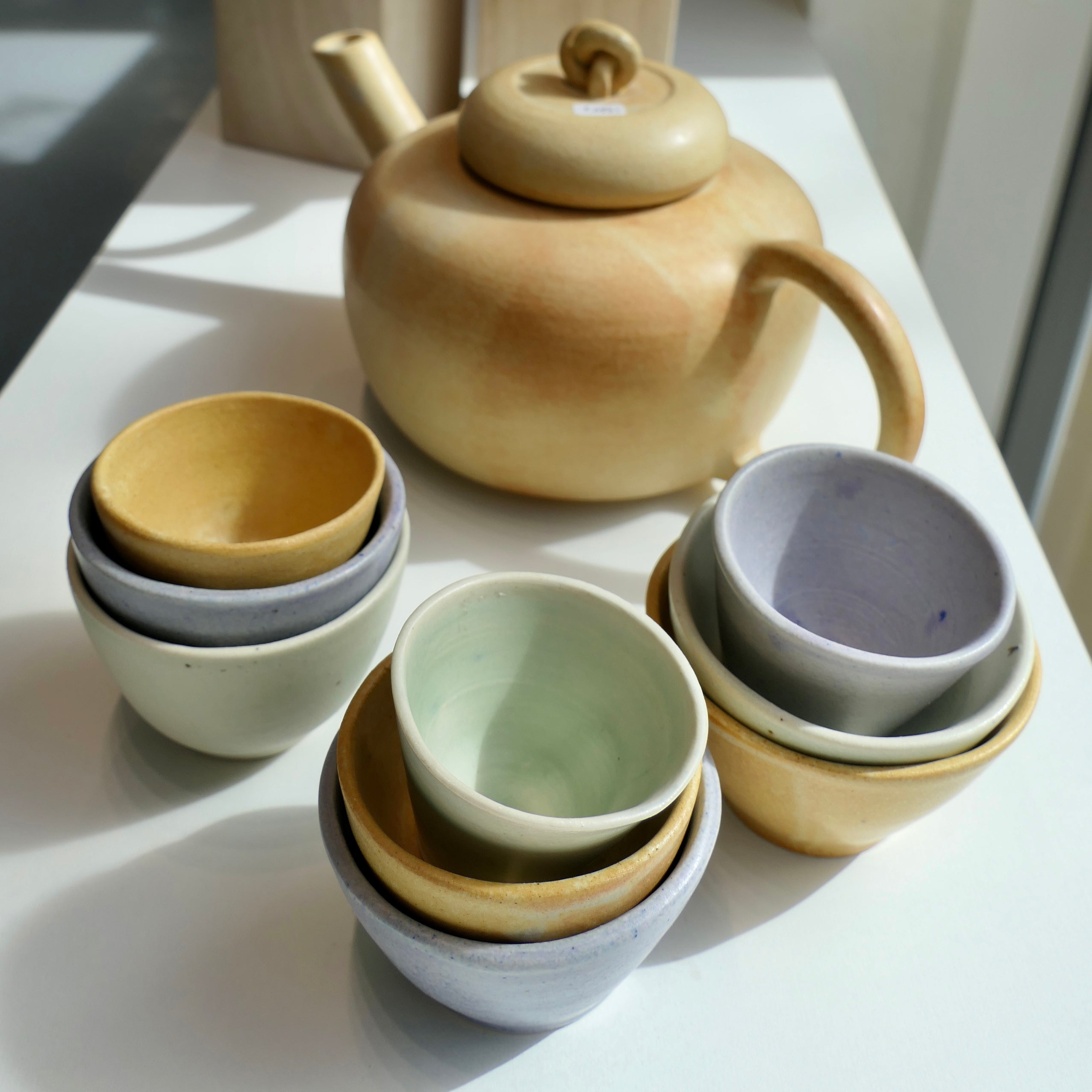 Tiny light green cups