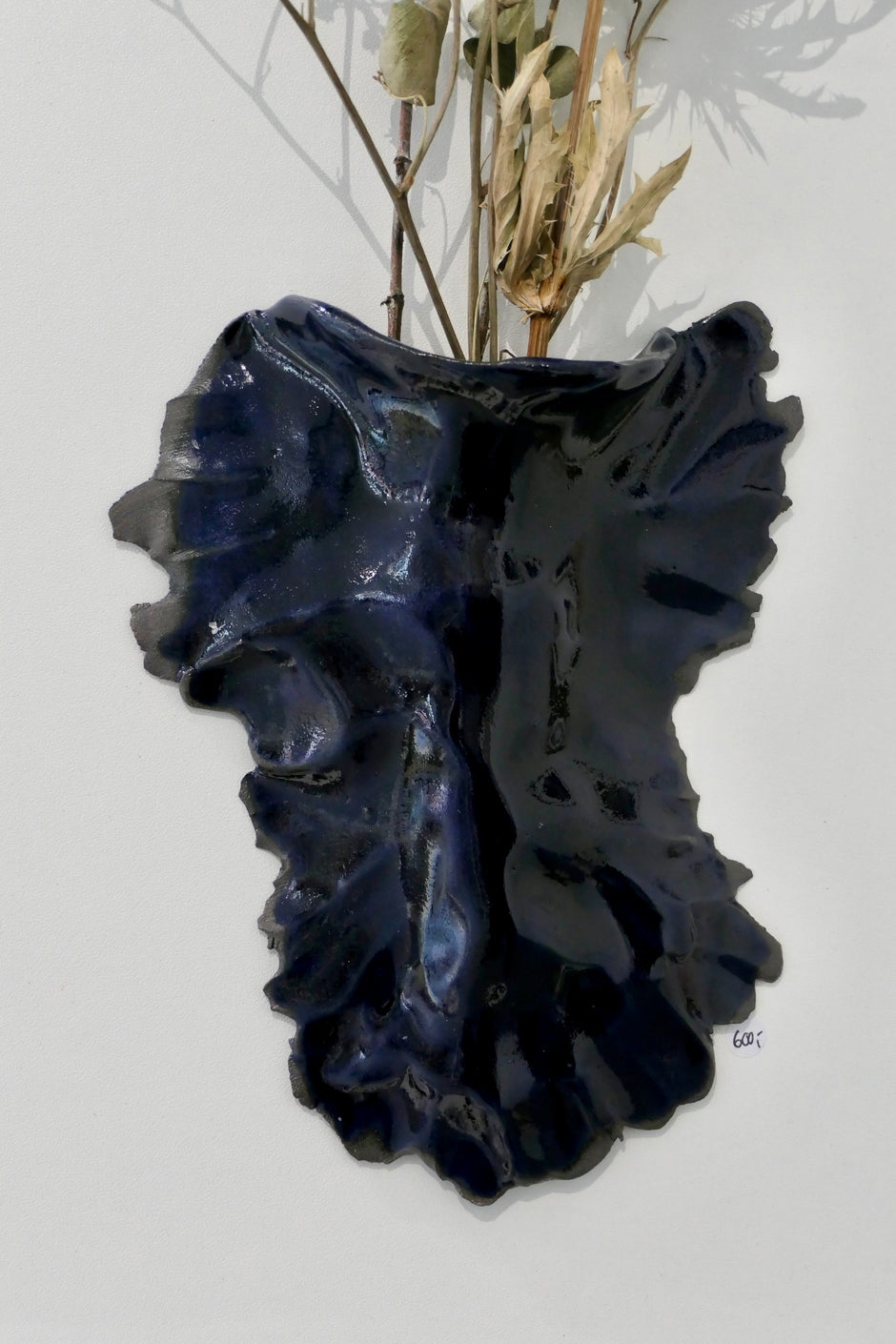 Dark blue wall vase