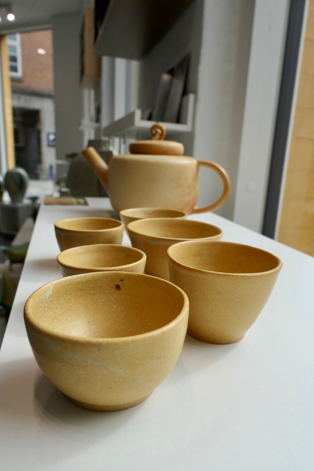 Tiny yellow cups
