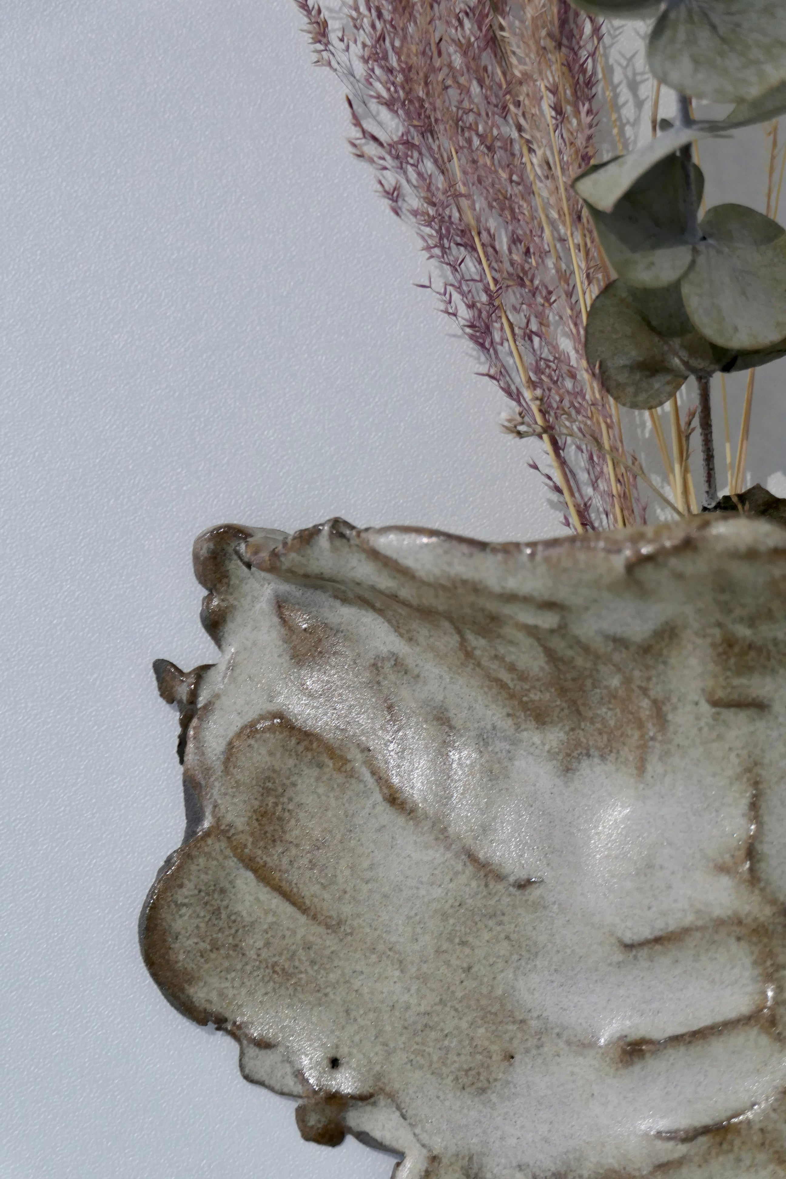 Sand-colored wall vase