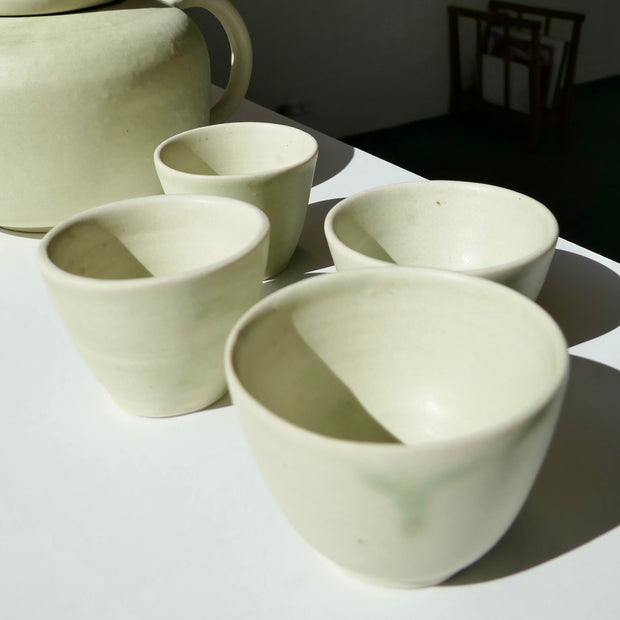 Tiny light green cups