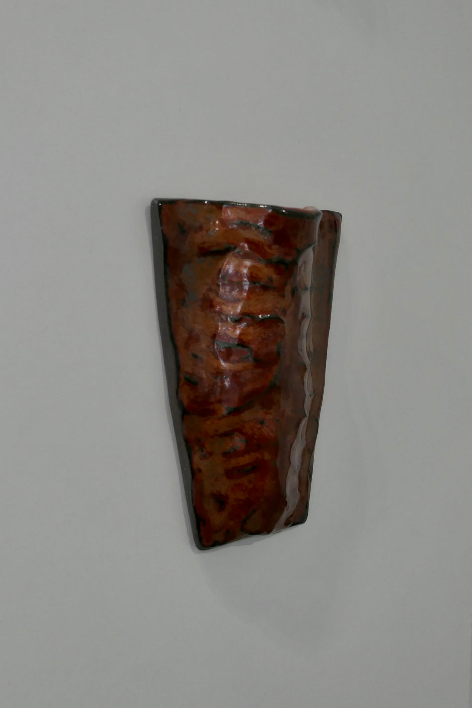 Flat dark red wall vase