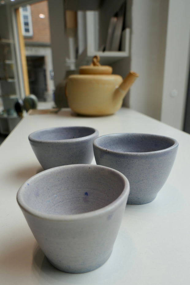 Tiny light purple cups