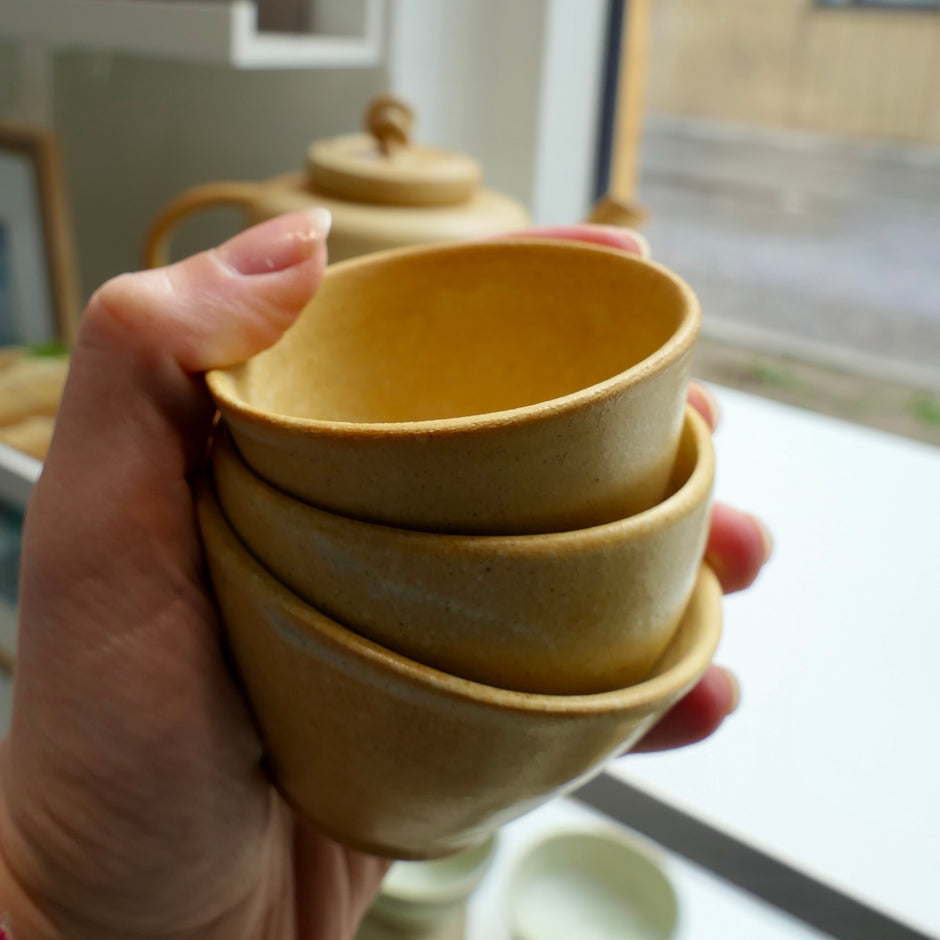 Tiny yellow cups