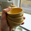 Tiny yellow cups