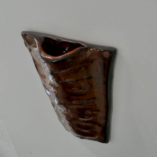 Flat dark red wall vase