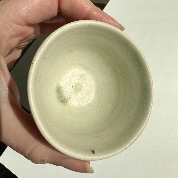 Tiny light green cups