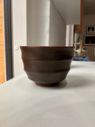 Wavy dark brown cup