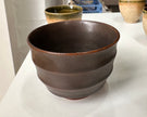 Wavy dark brown cup
