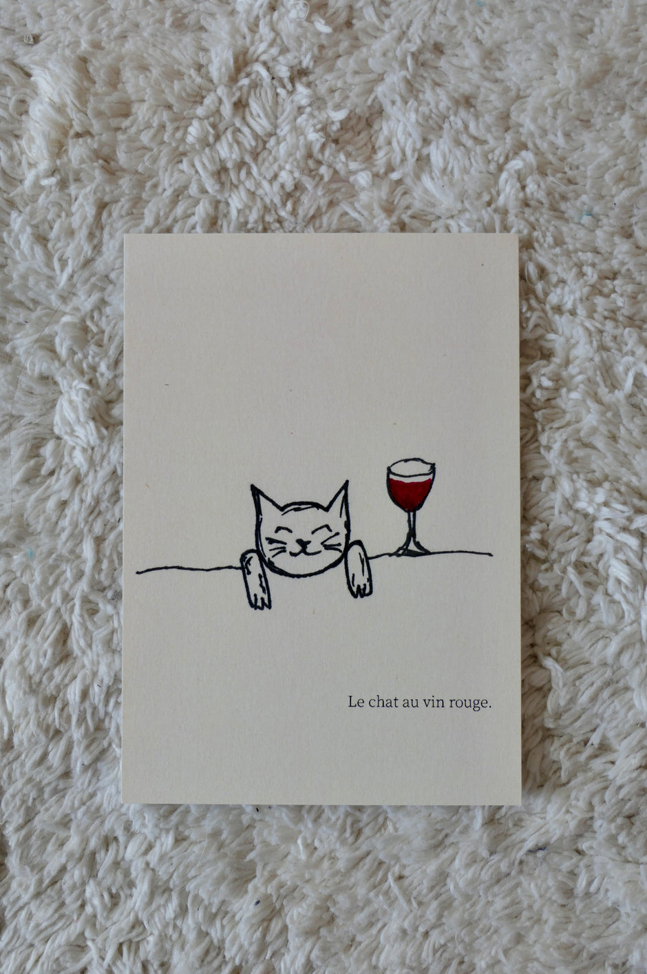 Le chat au vin rouge